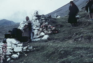 Women and men at the place of sheep sacrifice