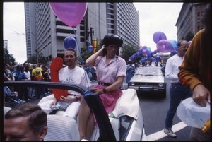 San Francisco AIDS Foundation members in a convertible in the San Francisco Pride Parade