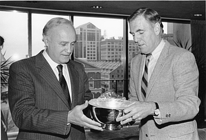 Mayor Raymond L. Flynn presenting a bowl to Greek Minister of Foreign Affairs Karolos Papoulias