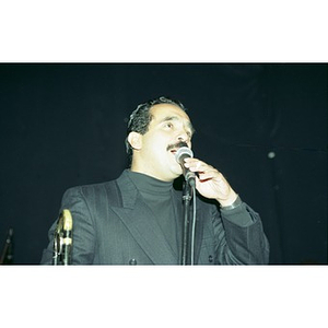 Willie Colon at the microphone at Cultura Viva.