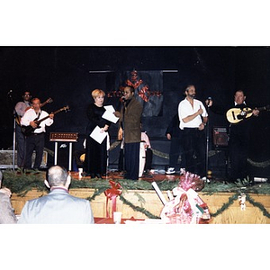 One of the judges at the microphone during an evening of musical entertainment at the Jorge Hernandez Cultural Center.