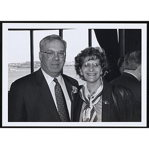Thomas M. Menino, Mayor of Boston, posing with an unidentified woman at a St. Patrick's Day Luncheon