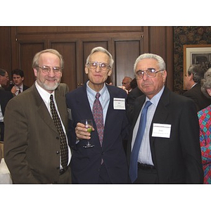 John Hatsopoulos, right, and three men at the gala dinner in his honor