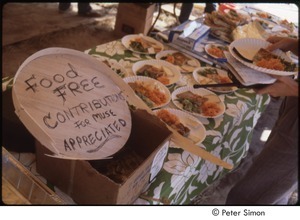 MUSE concert and rally: table with food and sign reading, 'food free, contributions for MUSE appreciated'