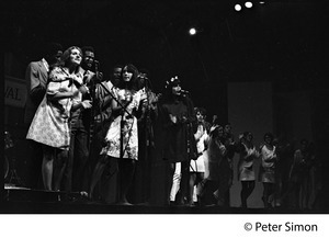 Judy Collins, Joan Baez, Mimi Farina (l. to r.) and the Chambers Brothers (rear) at the Newport Folk Festival