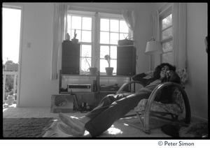 Writer Sara Davidson, reclining on a chair in her house in Venice