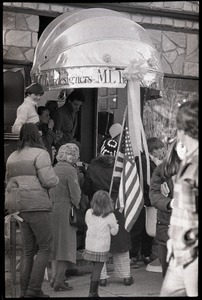Crowd gathered to greet the Iran hostages at Highland Falls, N.Y., in front of ML hair designers shop