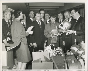 French delegation to ICD handling NFL helmets