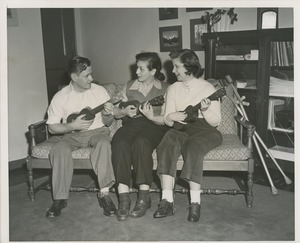 Clients playing ukuleles