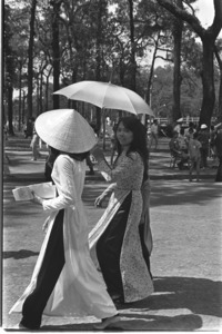 Vietnamese ladies strolling on Saigon Boulevard.