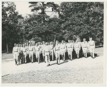 Soldiers marching in a formation on the Springfield College campus (May 1943)