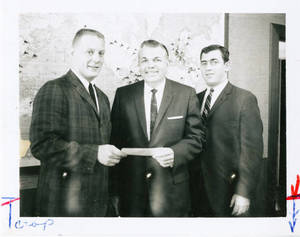 Wilbert E. Locklin standing with Dick Whiting and Doug Coupe