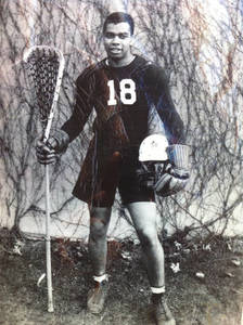 Freeman Moore with Lacrosse equipment