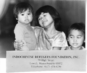 Photograph of three young children smiling, [1981].