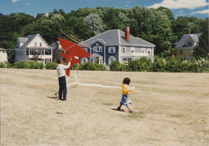 Kite Making: Soeun Tim and his father, Tim Sao, fly the kite, 1987