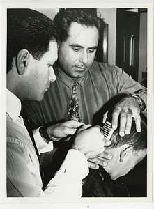 Eddie VanDinter gets a razor cut at "The Salon"