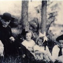 The Reverand F. C. Powell and children