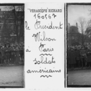 Soldiers watching the parade in Paris for President Wilson