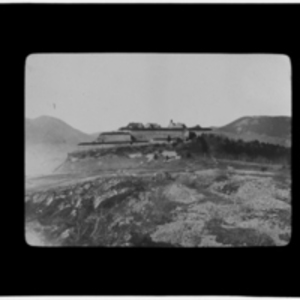 Vista of walled fortress on a hillside