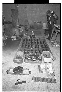 Loyalist "home-made arms" factory, The Spa, Ballynahinch, Co. Down. Display of captured weapons and ammunition