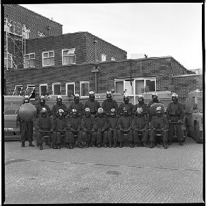 RUC Riot Squad. Formal photograph of 17 members of the squad taken at Castlereagh RUC station, Belfast