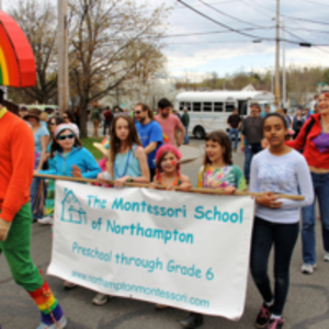 Montessori families and Staff march in the annual Pride Parade.