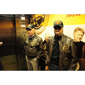 Harvey Sanford and Willis D. Saunders, Jr. in an elevator
