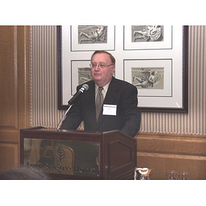 Barry Karger addressing audience at gala dinner