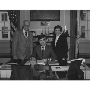 Governor Michael Dukakis signs a proclamation for co-op education week