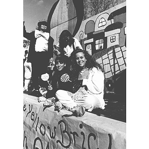 Students on a Wizard of Oz themed float at the Homecoming parade