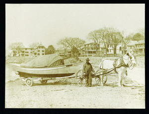 Will Sheppard with a boat, Swampscott, Mass., February 12, 1900