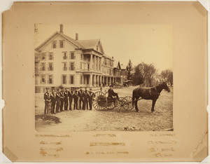 Group portrait of eleven Athol firemen and a horse-drawn fire hose