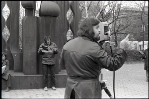 Cameraman preparing to film Richard Safft during interview by Channel 5 news