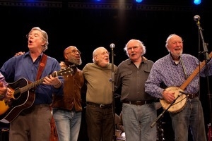 Pete Seeger performing on stage with Tom Paxton, Peter Yarow, Joh White, Jr., and John Sebastian (from right) at the Power of Song Award concert, Symphony Space, New York City