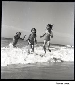 Carly Simon, Lucy Simon, and an unidentified girl play in the ocean