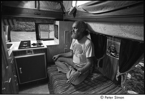 Ram Dass in his van, meditating