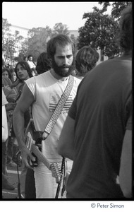 John Hall, with guitar, heading to the stage at the No Nukes concert and protest, Washington, D.C.