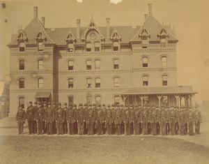 Class of 1871 members pose in uniform in front of North College