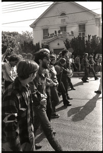 Antiwar demonstration at Fort Dix, N.J.: marching past Christian Serviceman's Center, arms linked and chanting