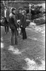 The Velvet Underground: (l.-r.) Sterling Morrison, Lou Reed, Doug Yule, and Maureen Tucker standing in a circle garden