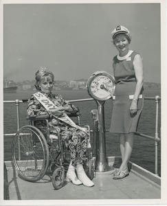 Mrs. Day in the sun on bridge of ship