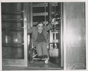 Client in wheelchair exiting ICD building