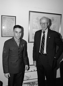 Congressman John W. Olver (right) with unidentified Marine corporal in his office