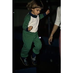 Child jogging in gym