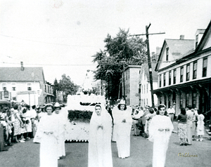 Procession with women in white dresses