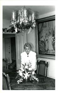 Florence Freitas setting table at Commonwealth House