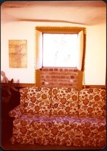 Sofa with floral print upholstery at Mt. Hermon School