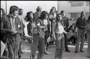 Hollywood Speedway Rock Festival: concert-goers standing near microphone stands