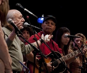 Guy Davis (center) and Peter Yarrow (left) performing on stage during the Power of Song Award concert, Symphony Space, New York City