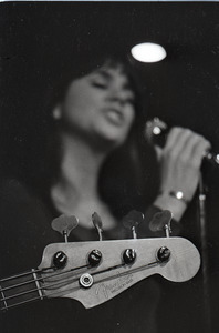Linda Ronstadt at Paul's Mall: Fender Precision bass headstock in foreground